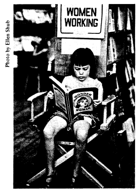 Image of young person reading a book entitled "WONDER WOMEN" with a sign saying "WOMEN WORKING" above them